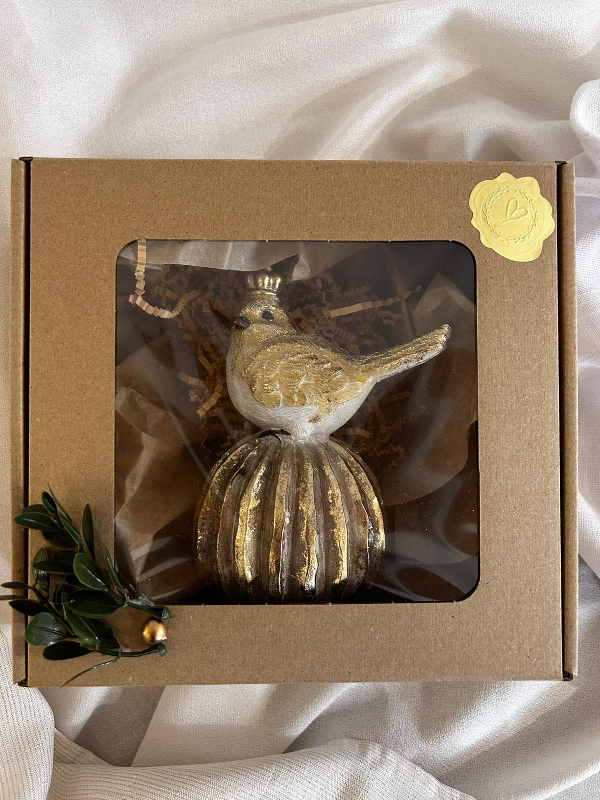 Figurka ptaszek na kuli